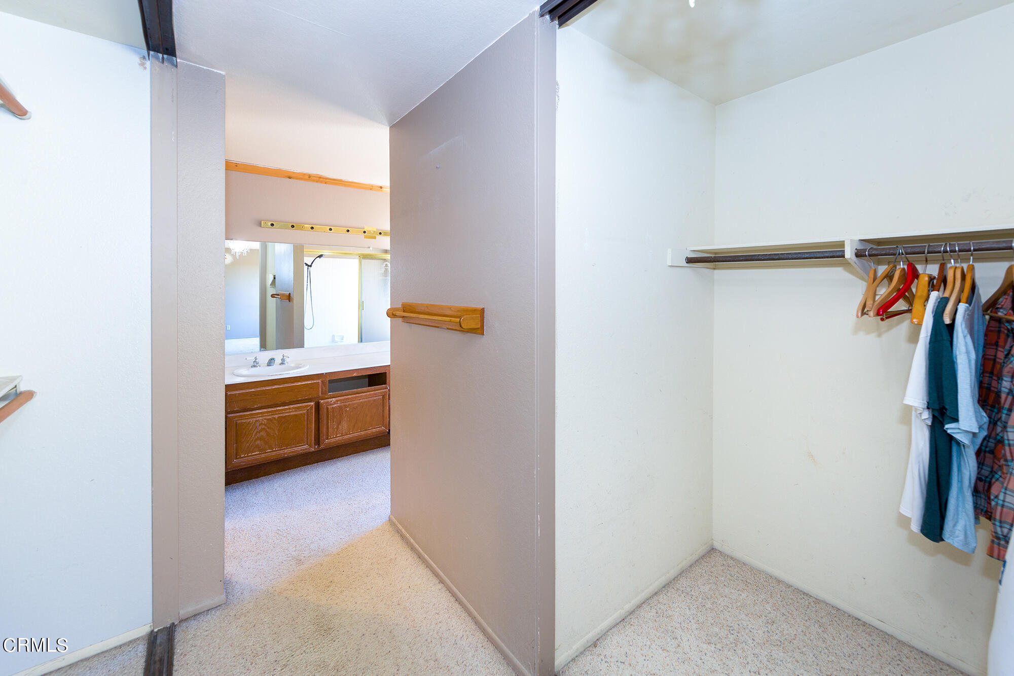 2033 Old Ranch Road Camarillo, CA 93012 - Photo 11 of 18 a view of walk in closet with clothes and shoes