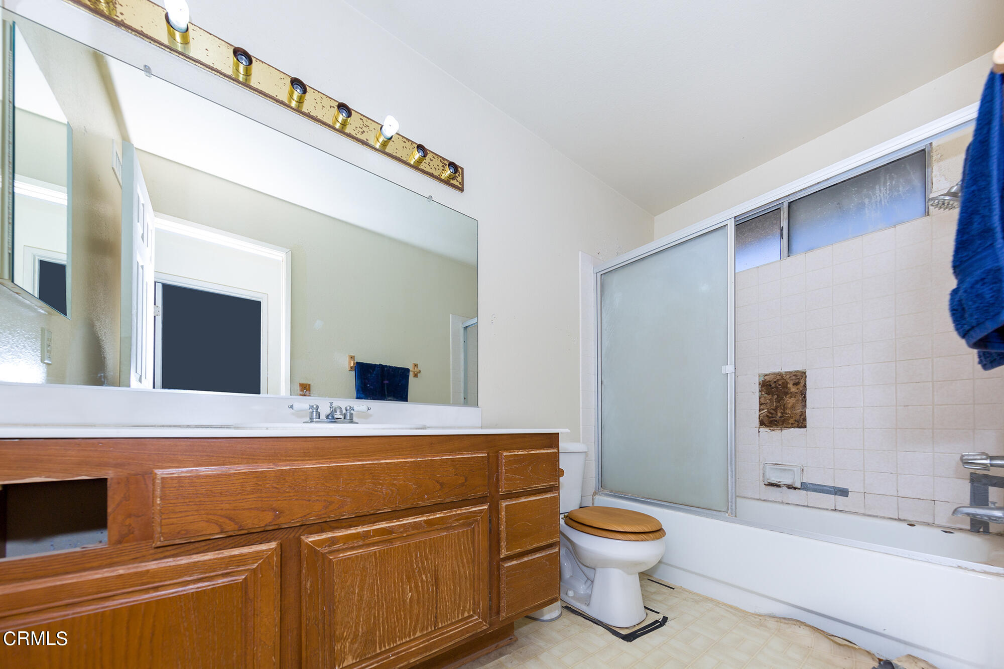 2033 Old Ranch Road Camarillo, CA 93012 - Photo 15 of 18 a bathroom with a sink a toilet and mirror