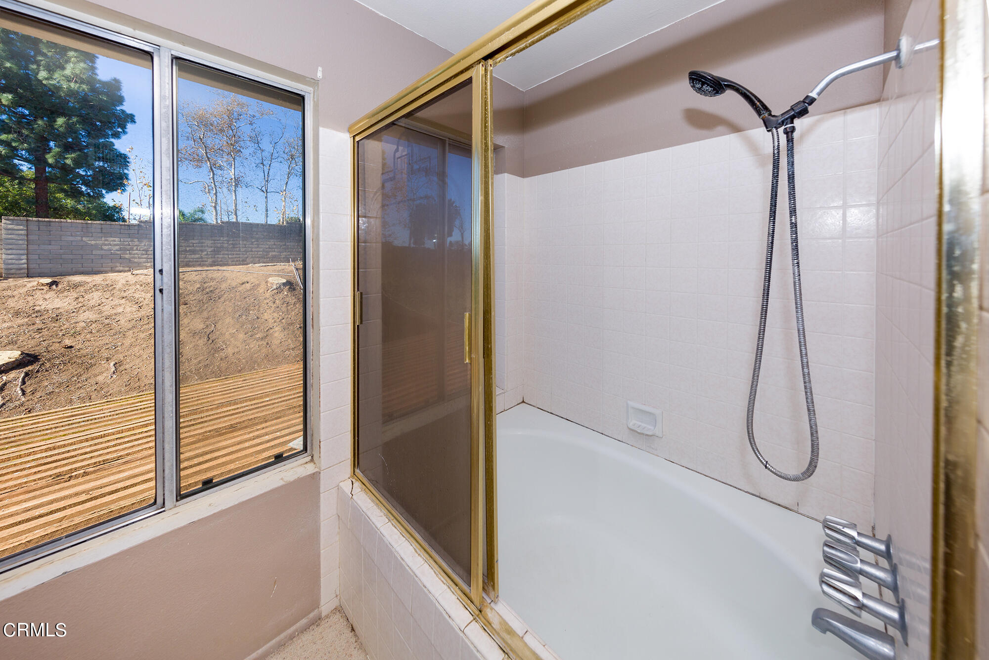 2033 Old Ranch Road Camarillo, CA 93012 - Photo 16 of 18 a bathroom with a glass shower door