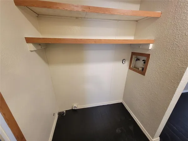 a view of storage and utility room