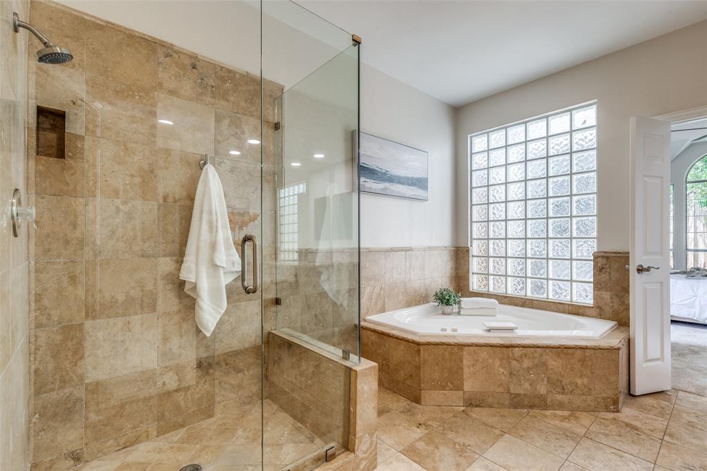 4037 Azure Lane Addison, TX 75001 - Photo 23 of 36 Bathroom with a stall shower, a garden tub, and ensuite bath