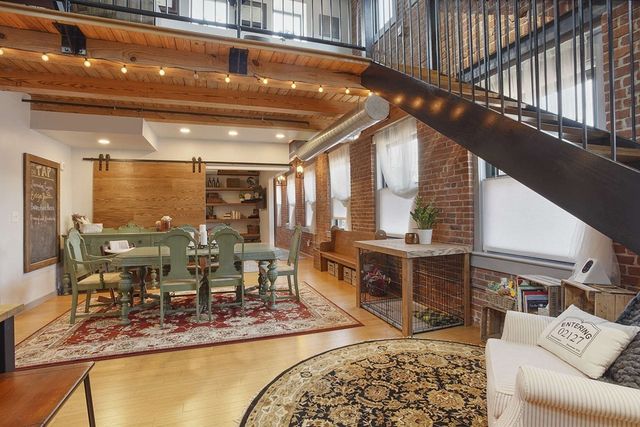 a view of a dining room with furniture