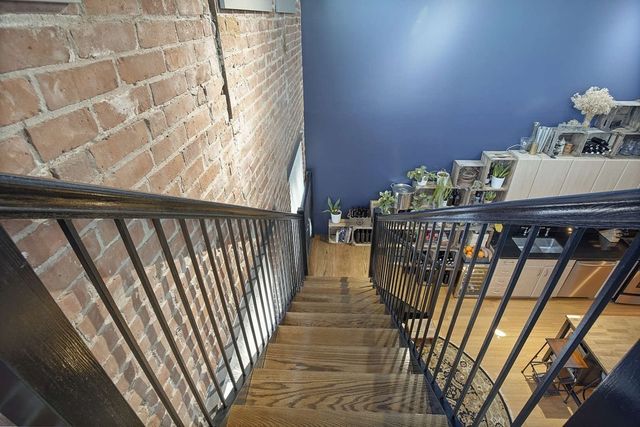 a kitchen with a wooden cabinets and a sink