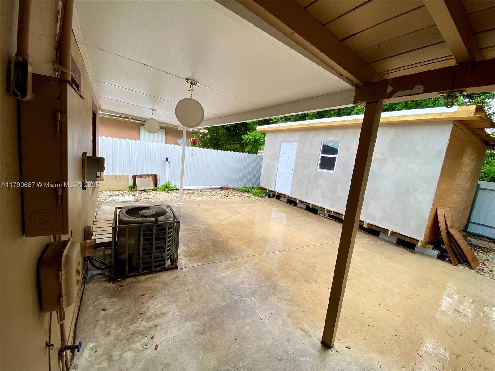 2340 Service Road Opa-Locka, FL 33054 - Photo 21 of 29 a room with gym equipment and a rug