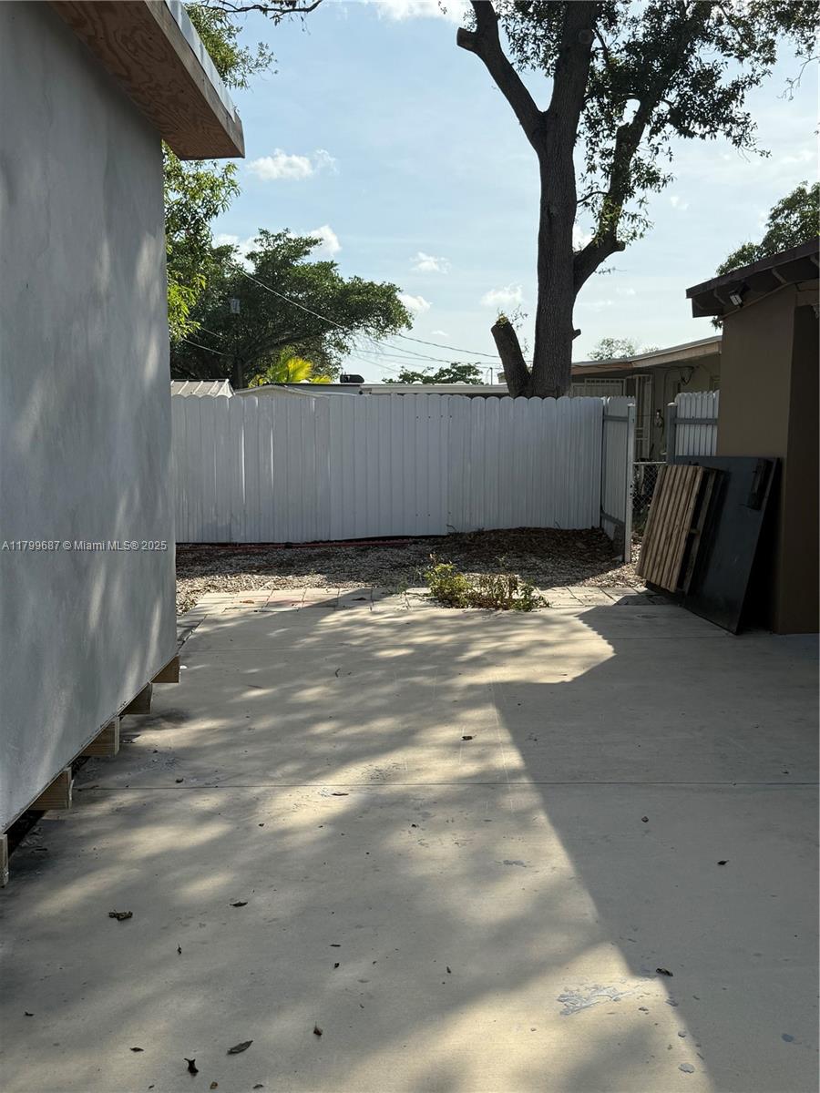 2340 Service Road Opa-Locka, FL 33054 - Photo 26 of 29 a view of a back yard of the house