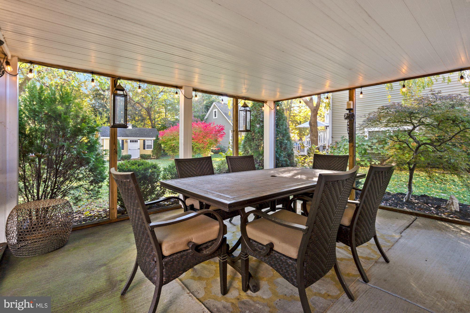 3320 2nd Road North Arlington, VA 22201 - Photo 25 of 31 Screened in porch overlooks back gardens