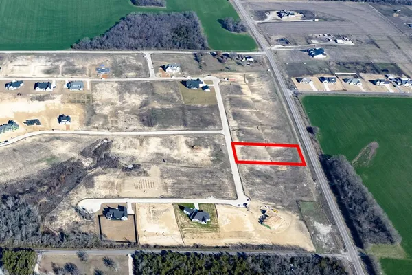 a view of swimming pool with a yard