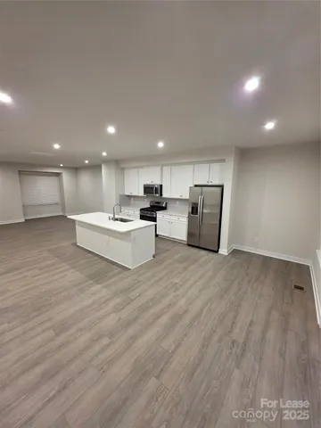 a view of kitchen with kitchen island