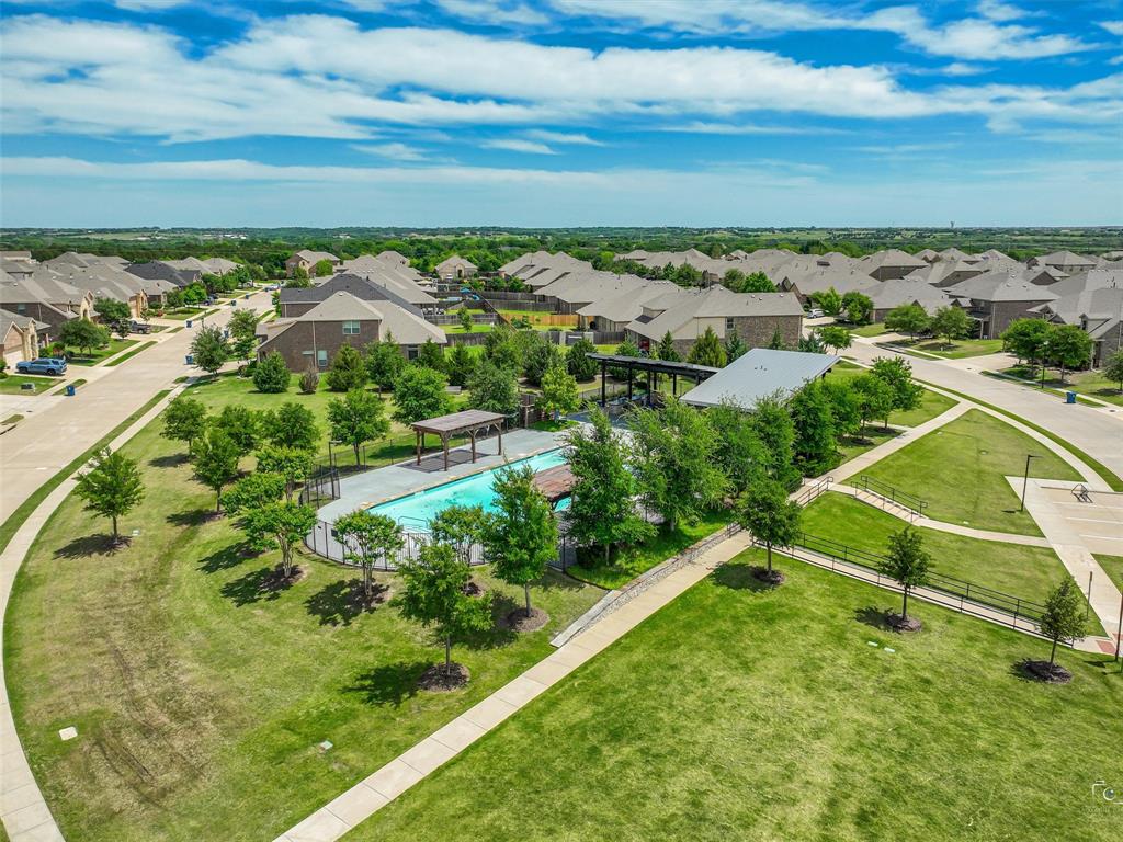 3106 Maverick Drive Forney, TX 75126 - Photo 28 of 32 an aerial view of residential houses with outdoor space