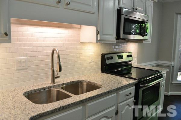 4503 Hamptonshire Drive Raleigh, NC 27613 - Photo 6 of 25