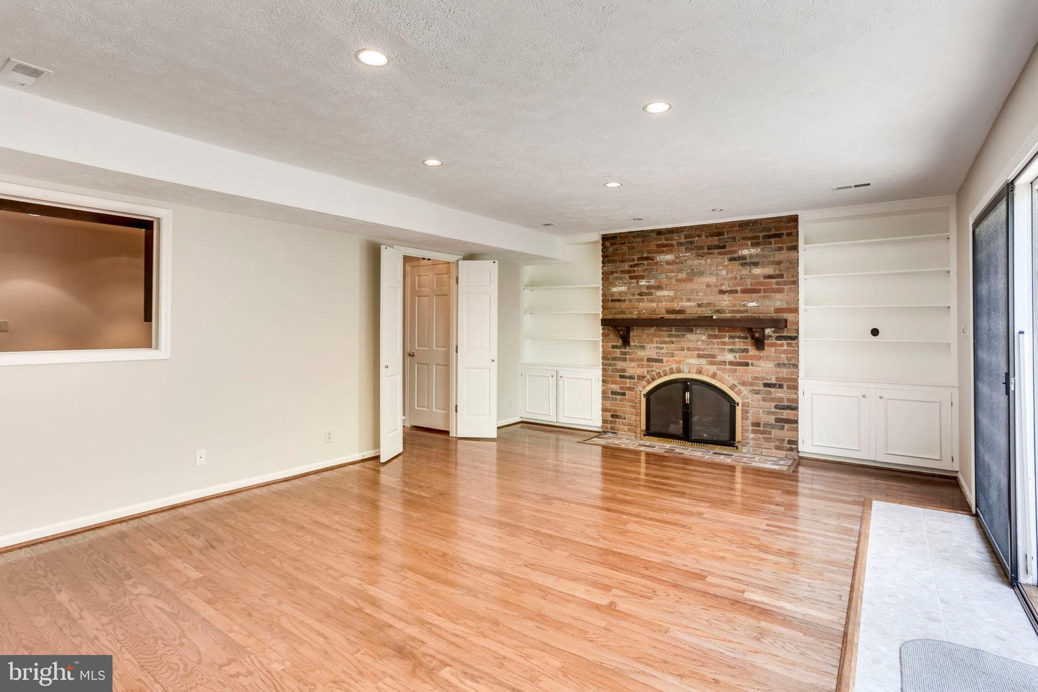 2307 North Glebe Road Arlington, VA 22207 - Photo 14 of 35 Main level living room has gas fireplace