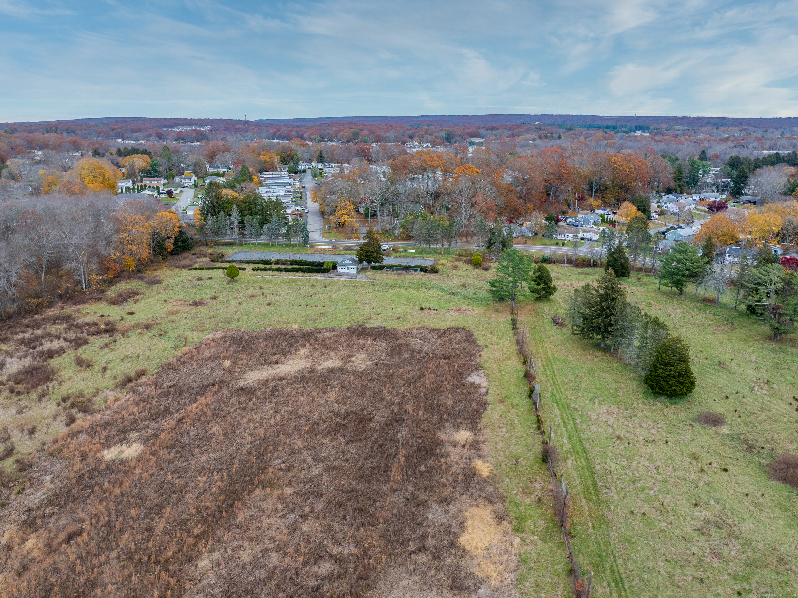 119 High Rock Road Groton, CT 06340 - Photo 17 of 22 a view of a town with big yard