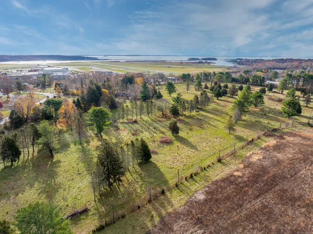 a view of a yard with an outdoor space