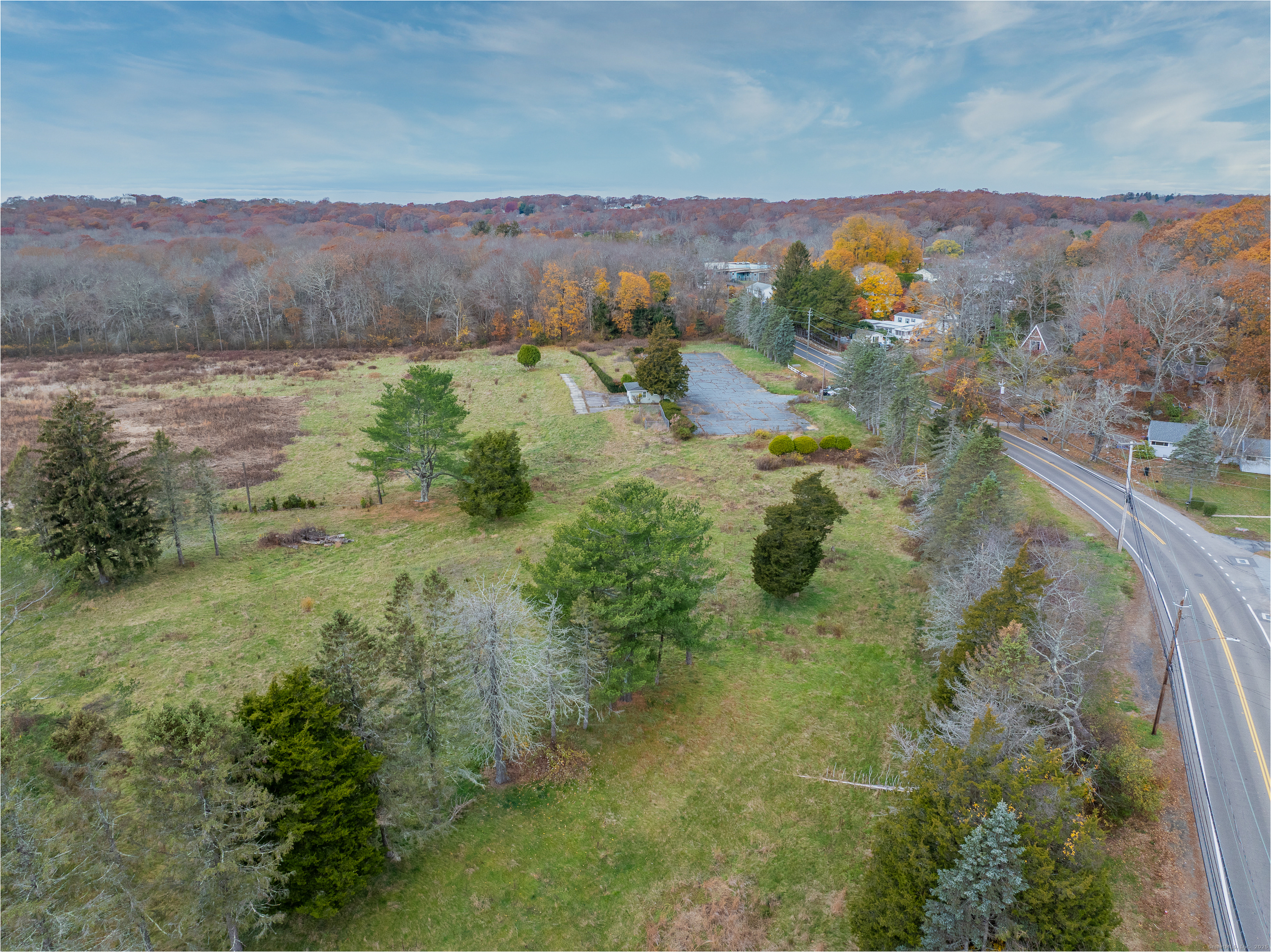 119 High Rock Road Groton, CT 06340 - Photo 21 of 22 a view of a lush green hillside and houses
