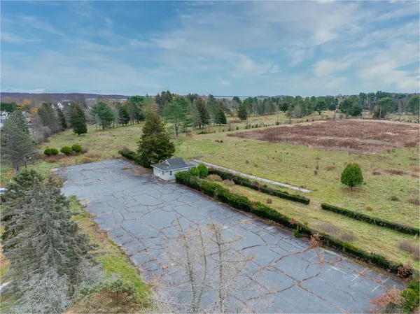 a view of a field with an outdoor space