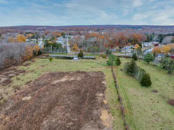 a view of a town with big yard