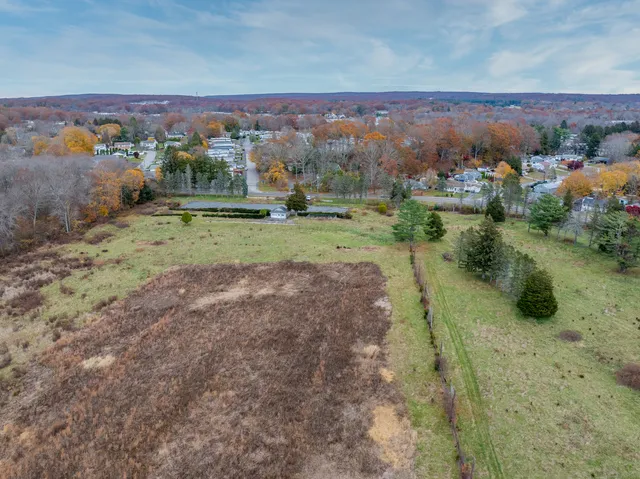 a view of a town with big yard