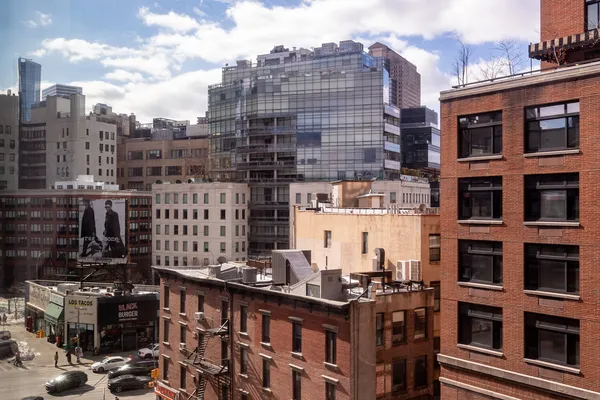 a front view of a building with glass windows