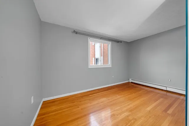 a view of a room with a window