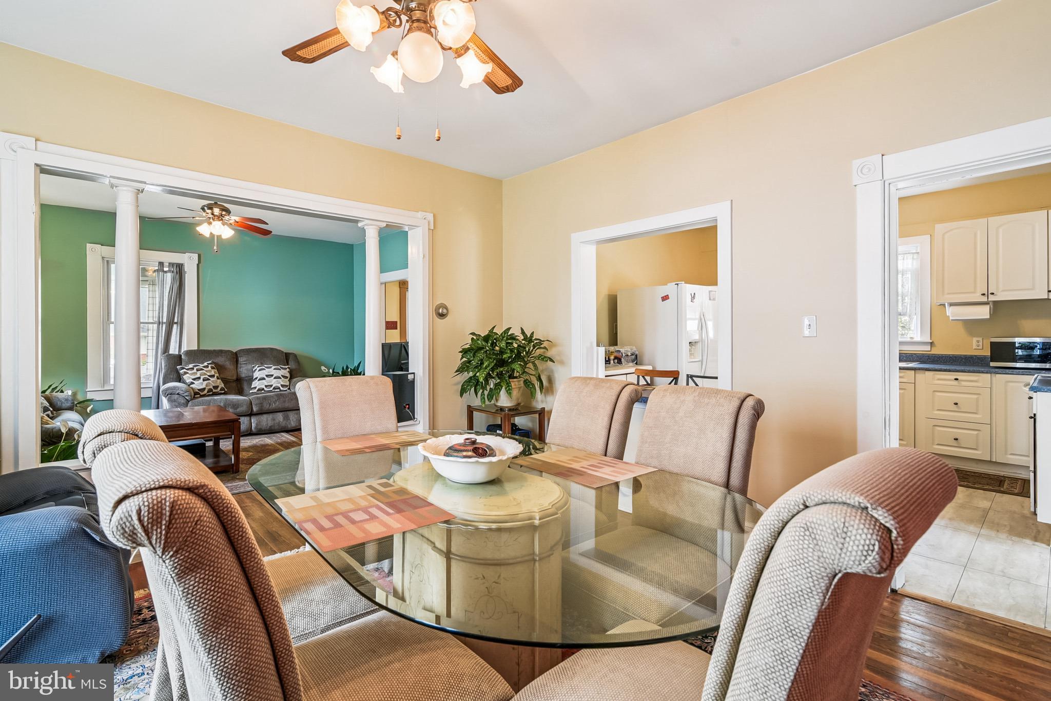 16 Columbia Avenue Crisfield, MD 21817 - Photo 11 of 36 a living room with furniture and a large window