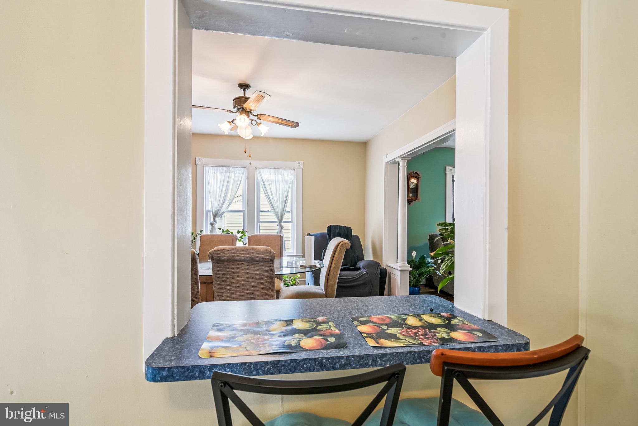 16 Columbia Avenue Crisfield, MD 21817 - Photo 14 of 36 a view of a dining room with furniture window and outside view
