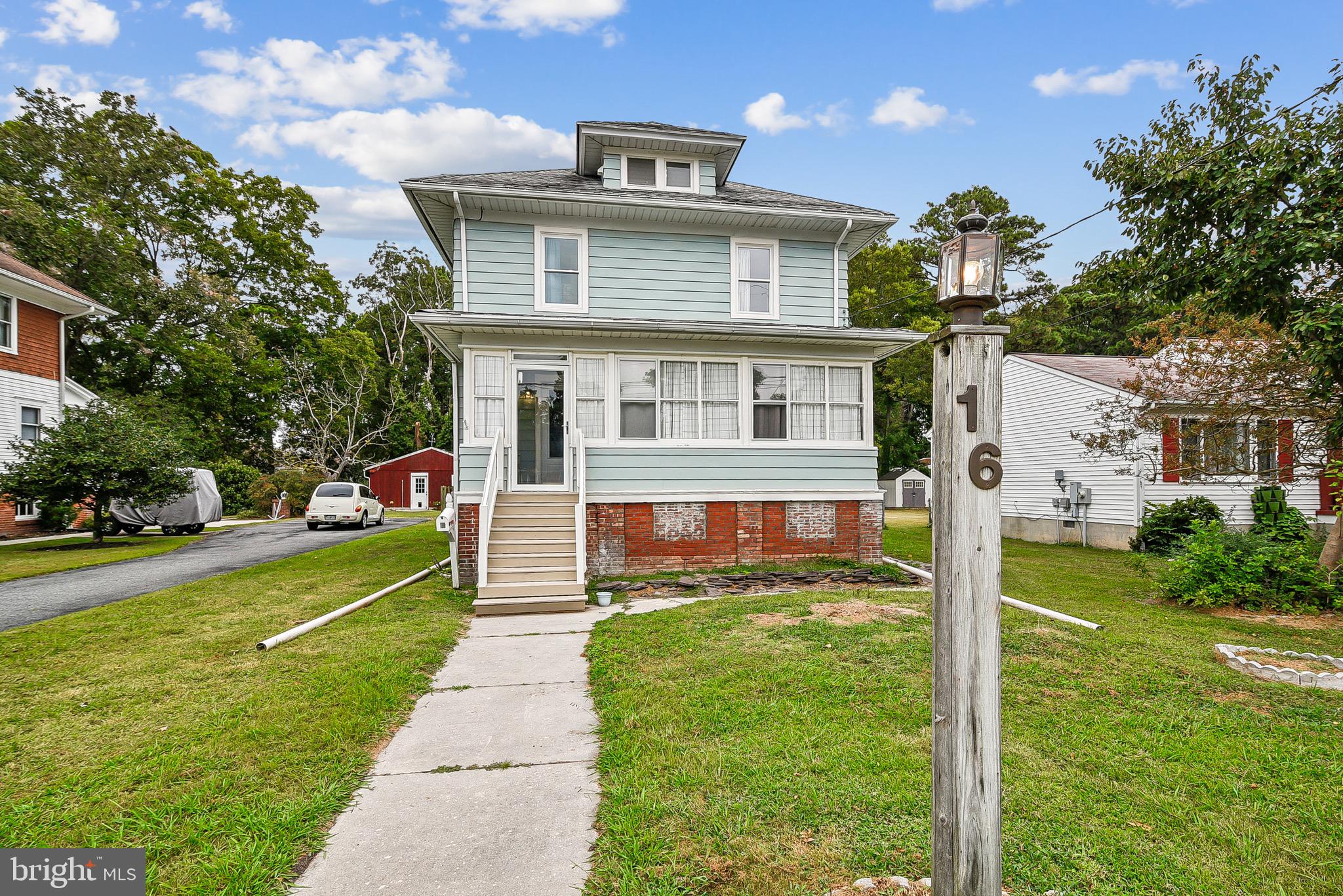 16 Columbia Avenue Crisfield, MD 21817 - Photo 3 of 36 a view of a house with a yard