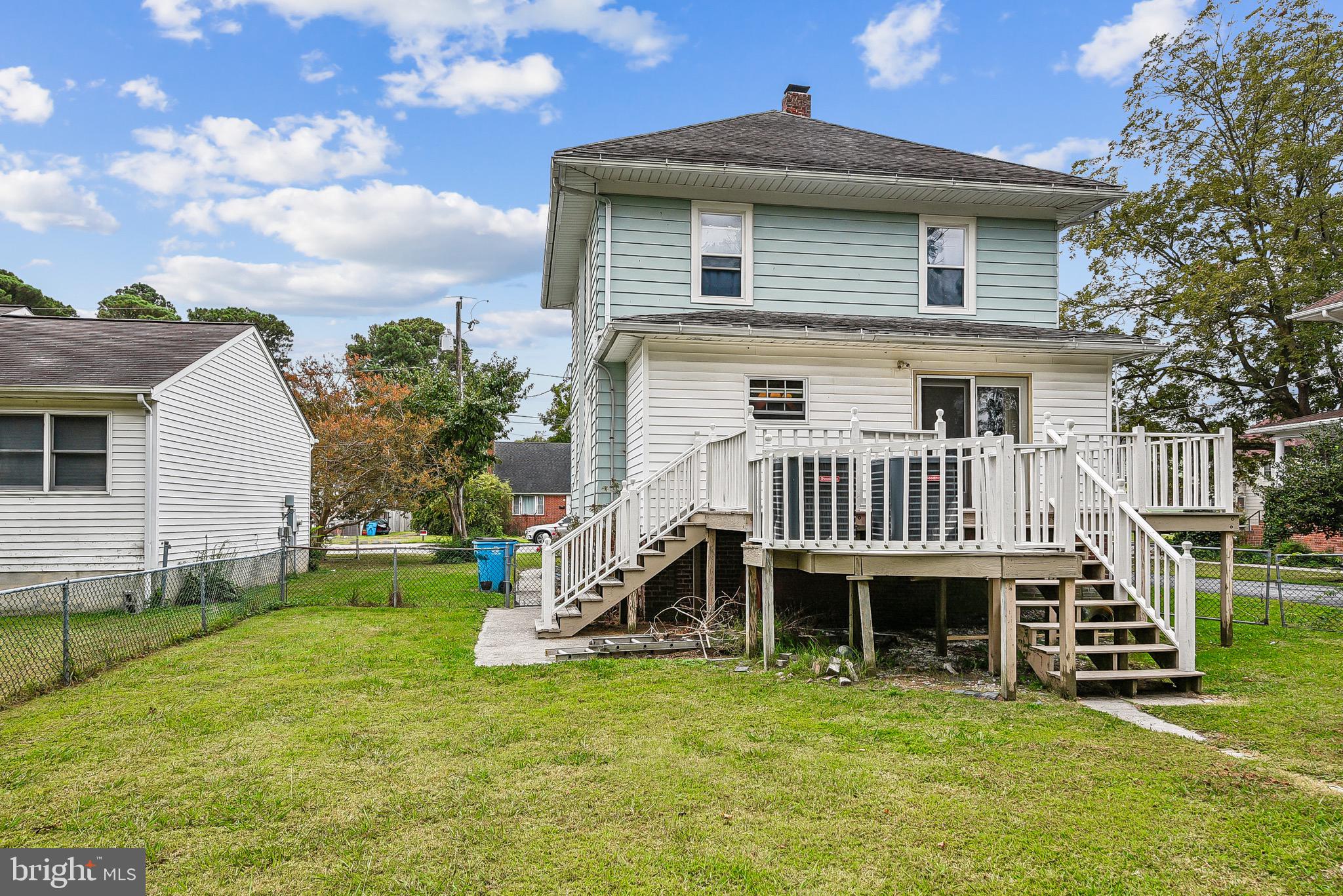 16 Columbia Avenue Crisfield, MD 21817 - Photo 34 of 36 a view of a house with a yard