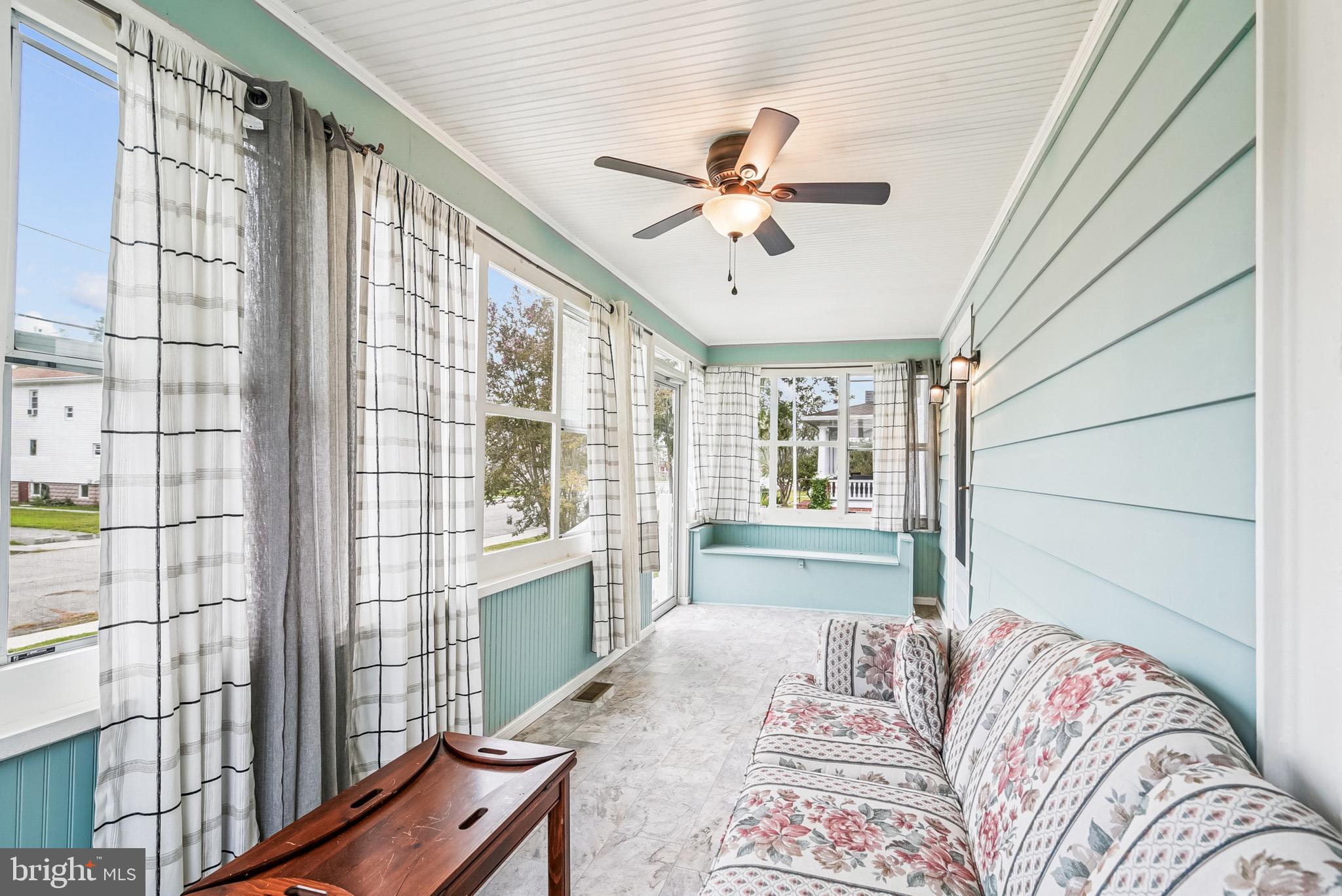 16 Columbia Avenue Crisfield, MD 21817 - Photo 5 of 36 a bedroom with a large bed and a window