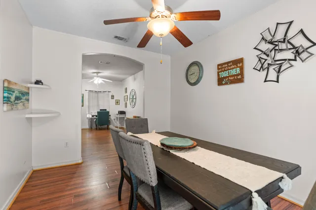 a view of a dining room with furniture