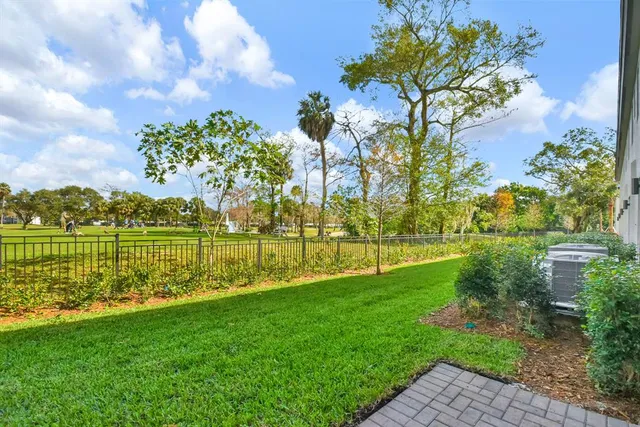 a view of a lake with a big yard