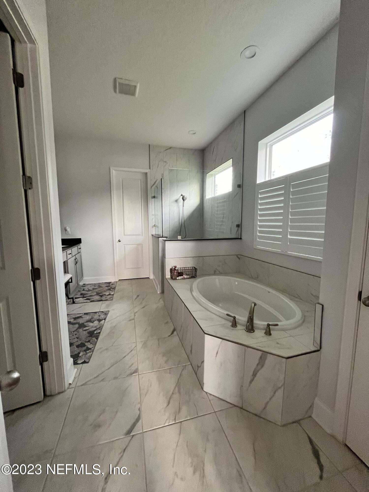 1753 Nolan Road Middleburg, FL 32068 - Photo 39 of 54 Master Bath 1