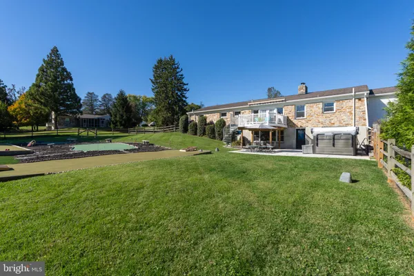 a view of a house with a big yard
