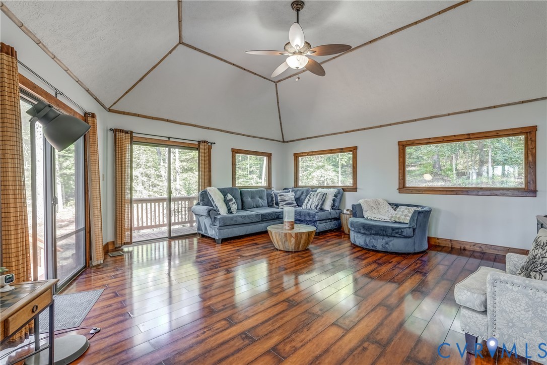 7399 Club Drive Quinton, VA 23141 - Photo 15 of 42 a living room with furniture flat screen and a window