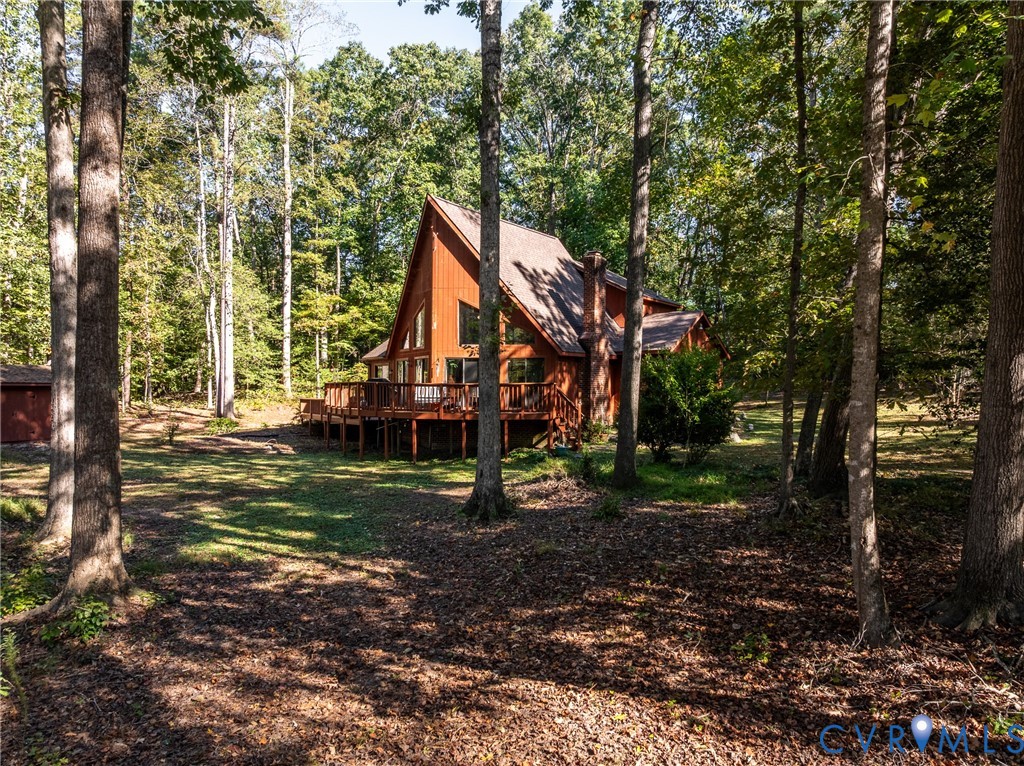 7399 Club Drive Quinton, VA 23141 - Photo 26 of 42 a view of a house with a yard