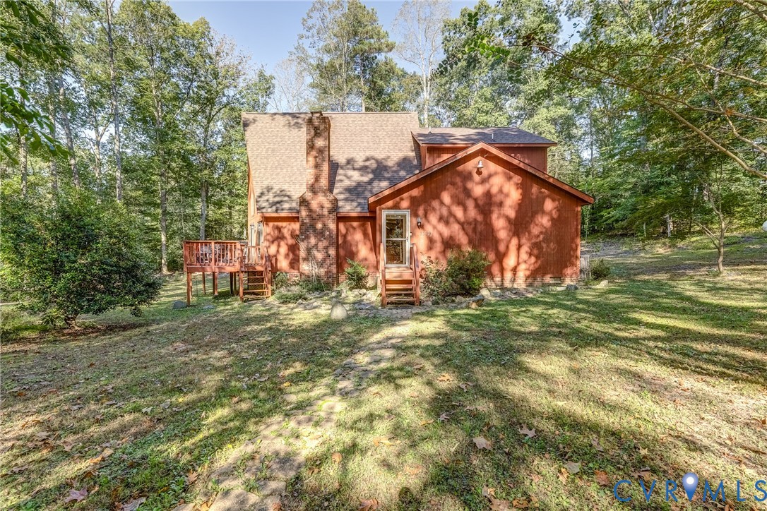 7399 Club Drive Quinton, VA 23141 - Photo 30 of 42 a view of a house with a yard