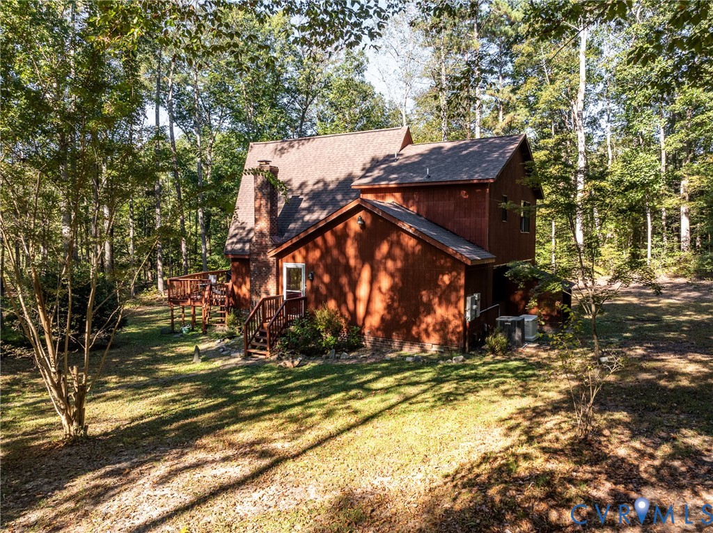 7399 Club Drive Quinton, VA 23141 - Photo 42 of 42 a view of a house with large trees