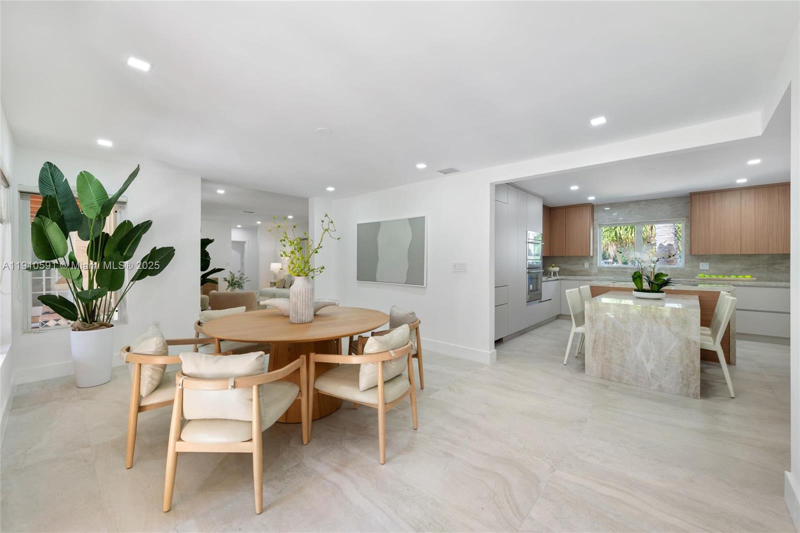 5211 Granada Boulevard Coral Gables, FL 33146 - Photo 9 of 25 a view of a dining room with furniture