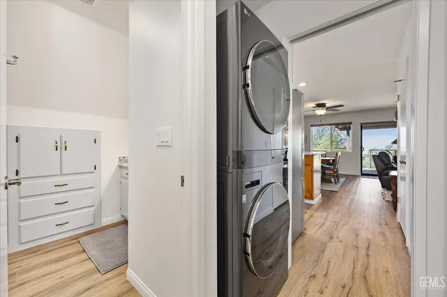 a view of a hallway with washer and dryer