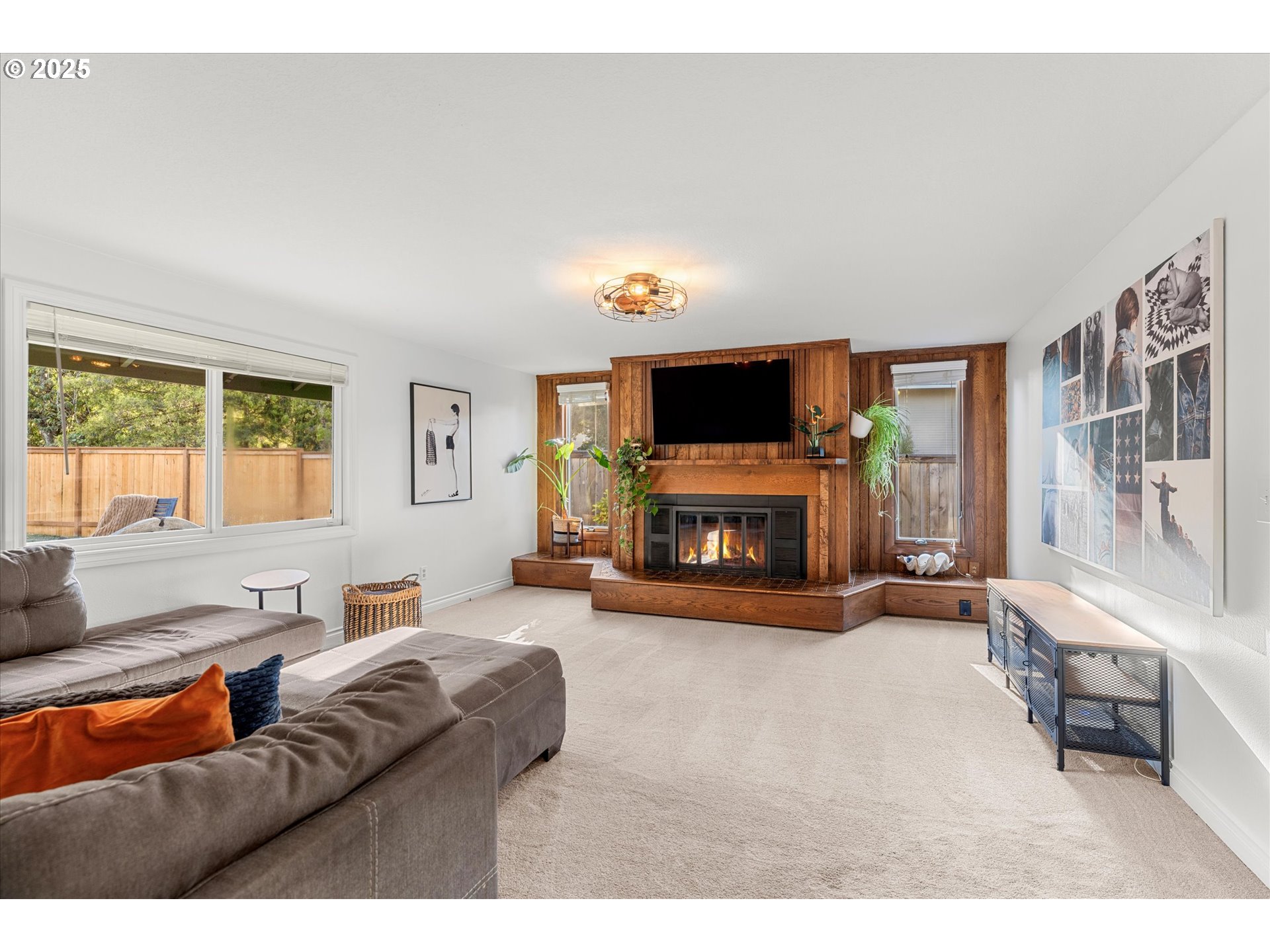 20070 Southwest Imperial Street Beaverton, OR 97003 - Photo 24 of 48 a living room with furniture and a fireplace