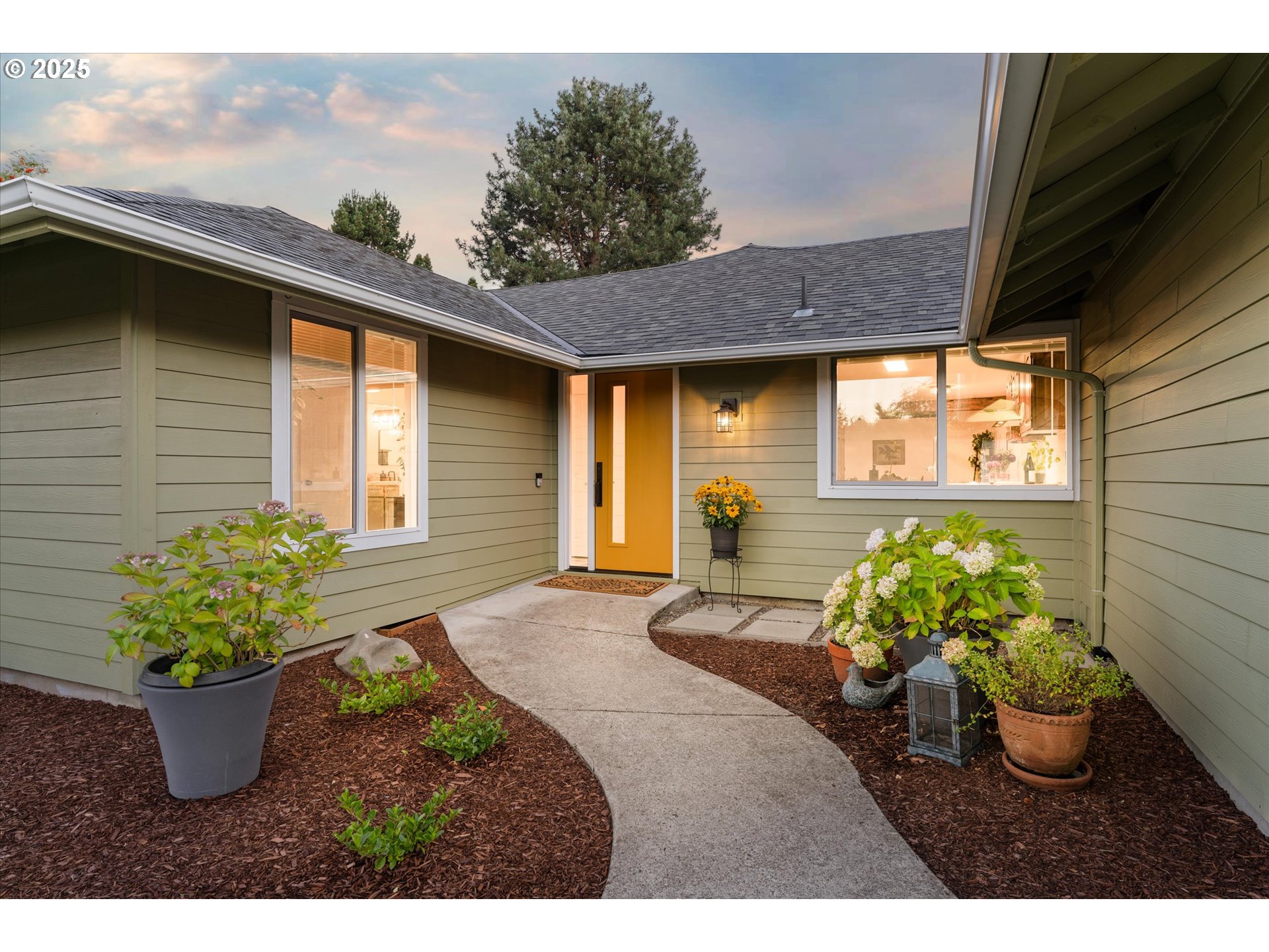 20070 Southwest Imperial Street Beaverton, OR 97003 - Photo 3 of 48 a front view of a house with a yard
