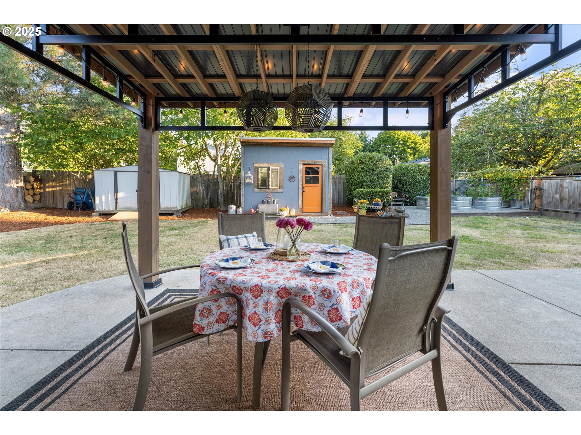 20070 Southwest Imperial Street Beaverton, OR 97003 - Photo 42 of 48 a view of an outdoor dining space with a table and chairs