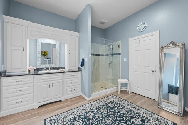 a utility room with sink dryer and washer