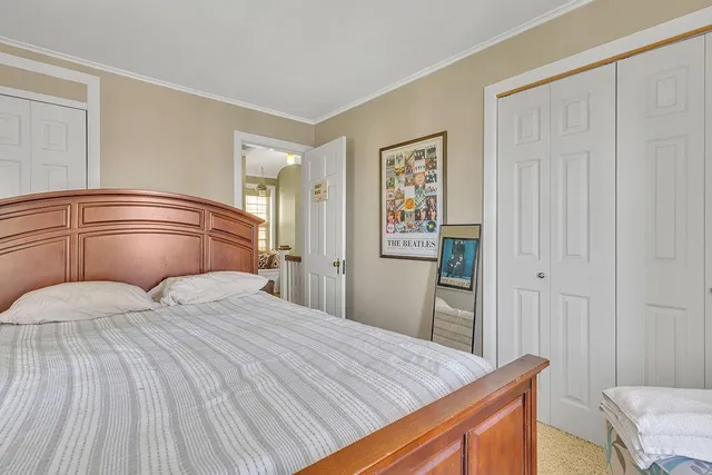 a room with musical instrument pool table and windows