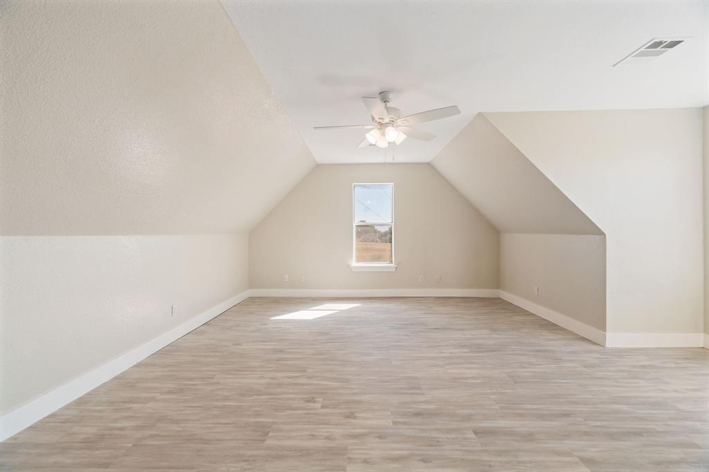 1943 Alsdorf Road Ennis, TX 75119 - Photo 32 of 39 wooden floor in an empty room