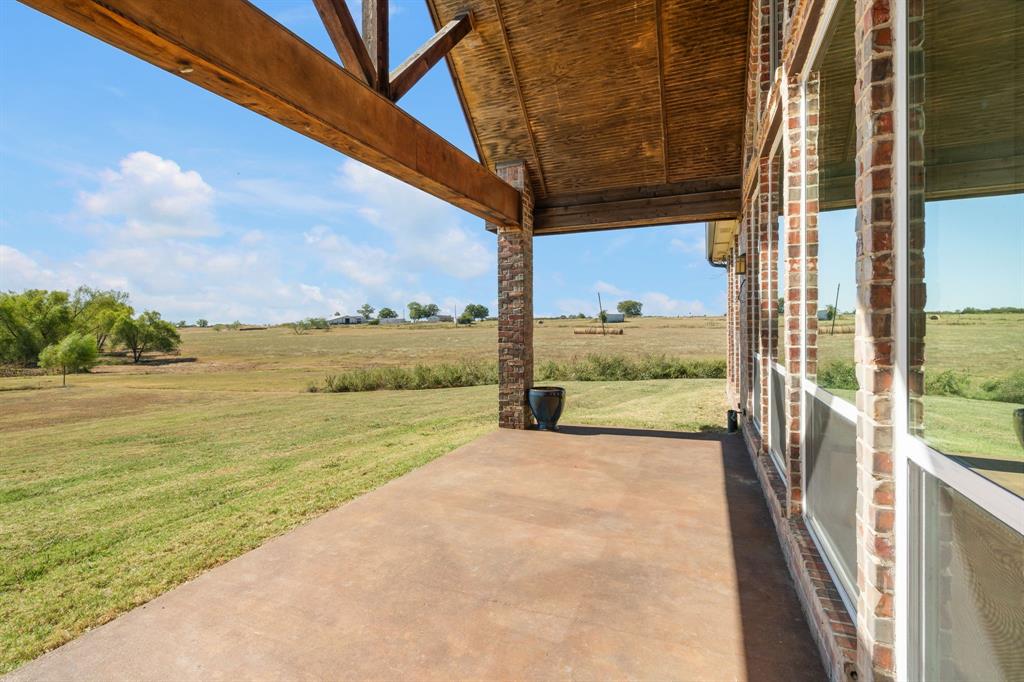 1943 Alsdorf Road Ennis, TX 75119 - Photo 35 of 39 a view of a room with an ocean view