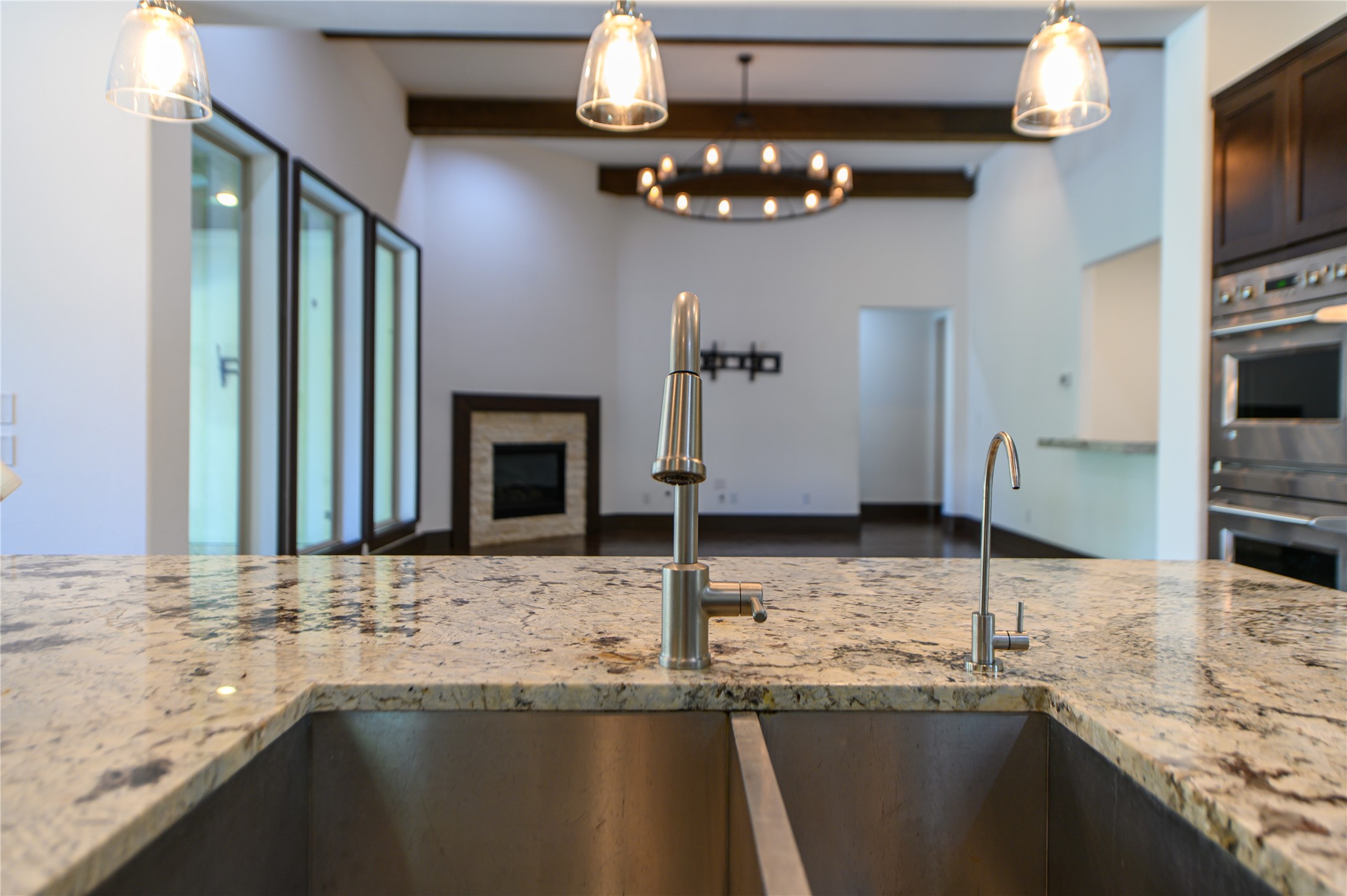 30 Freestone Stream Place Spring, TX 77389 - Photo 19 of 43 SINK FACING LIVING AREA
