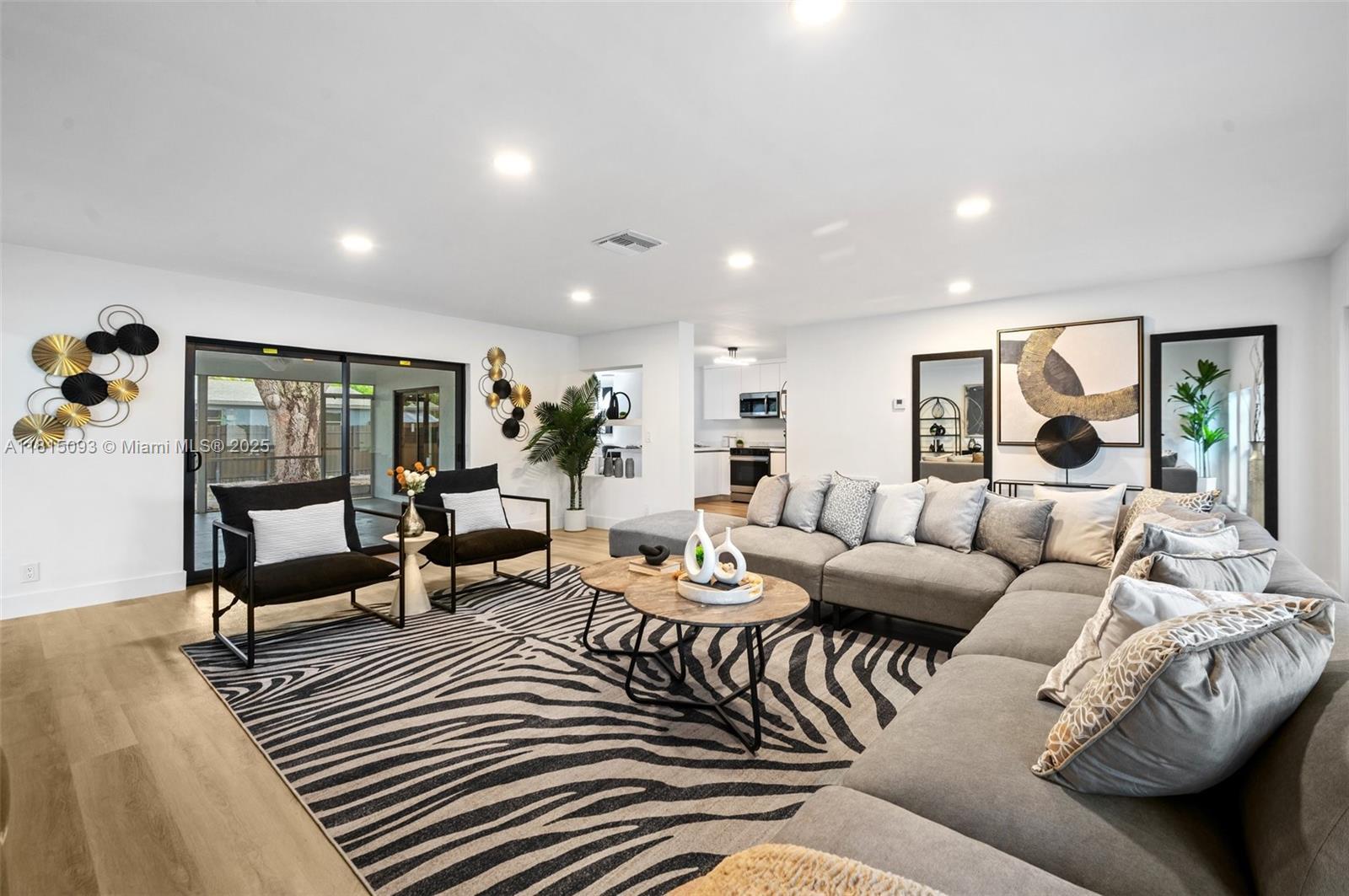 679 Southwest 17th Court Boca Raton, FL 33486 - Photo 3 of 18 a living room with furniture