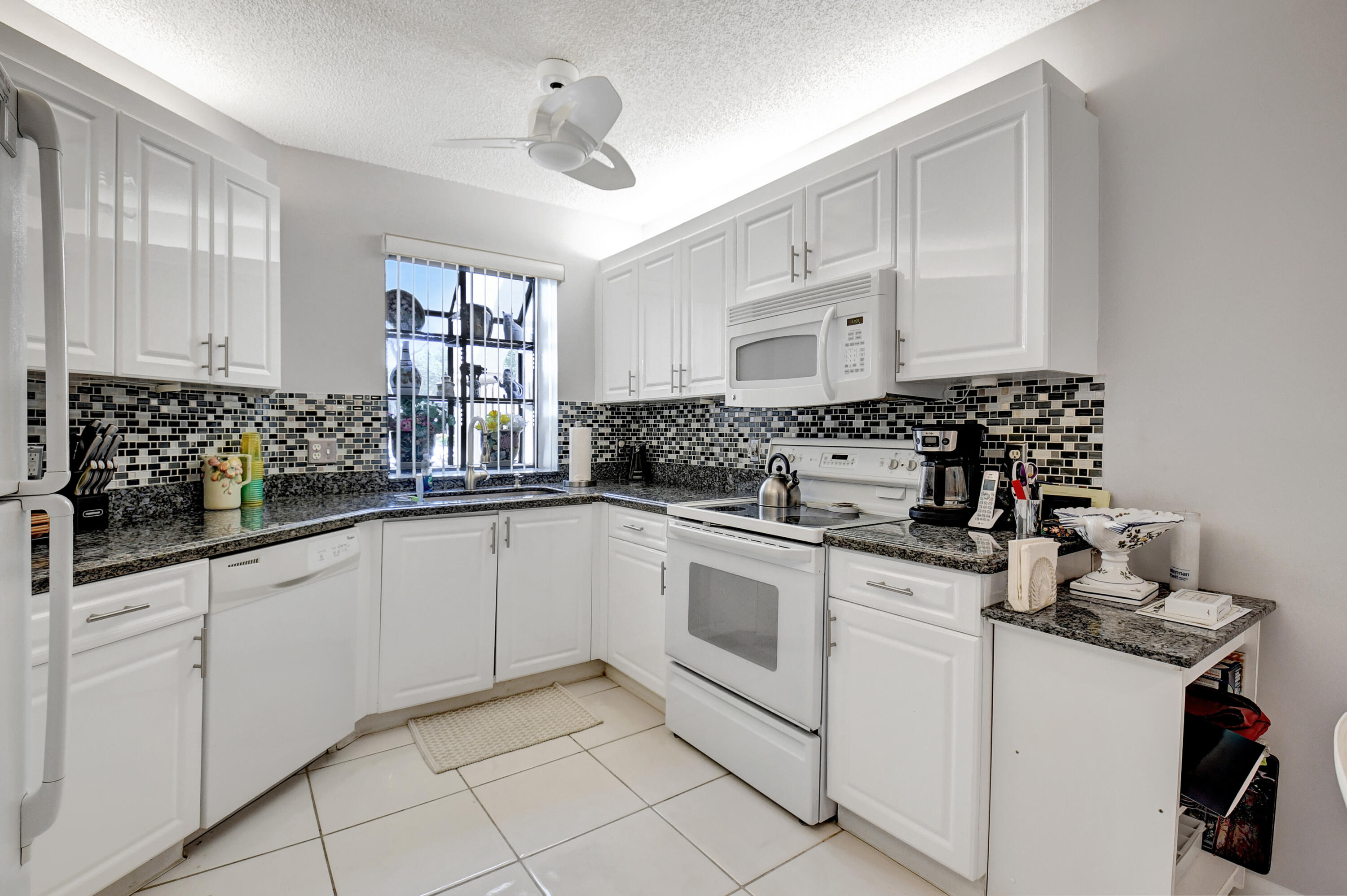 5217 Brisata Circle, Unit E Boynton Beach, FL 33437 - Photo 12 of 56 Kitchen