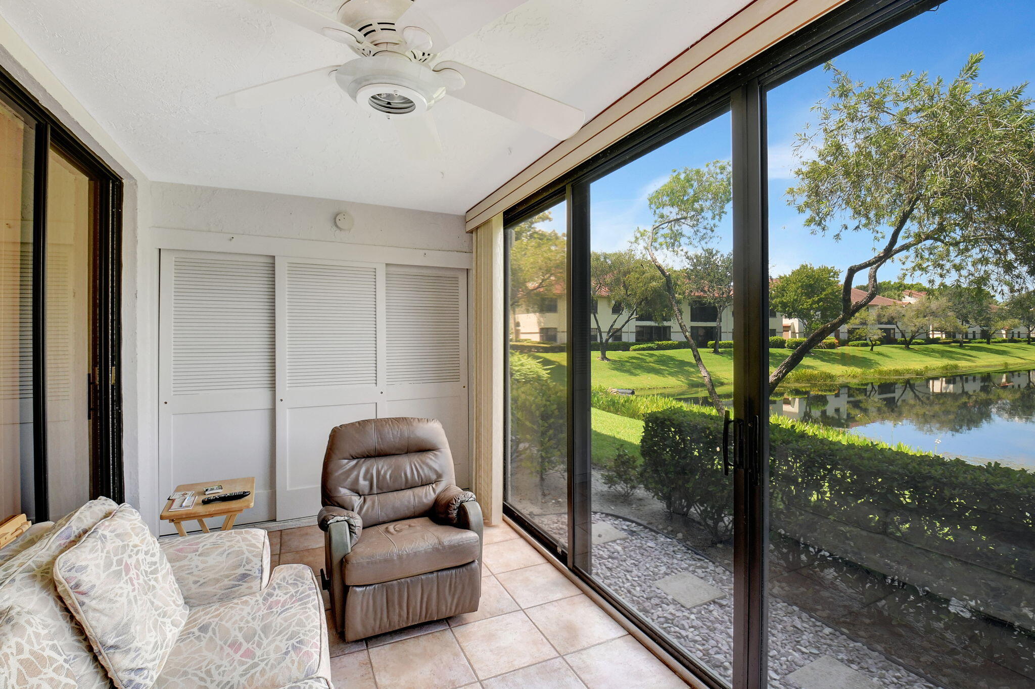 5217 Brisata Circle, Unit E Boynton Beach, FL 33437 - Photo 15 of 56 Glass & Screen Enclosed Lanai