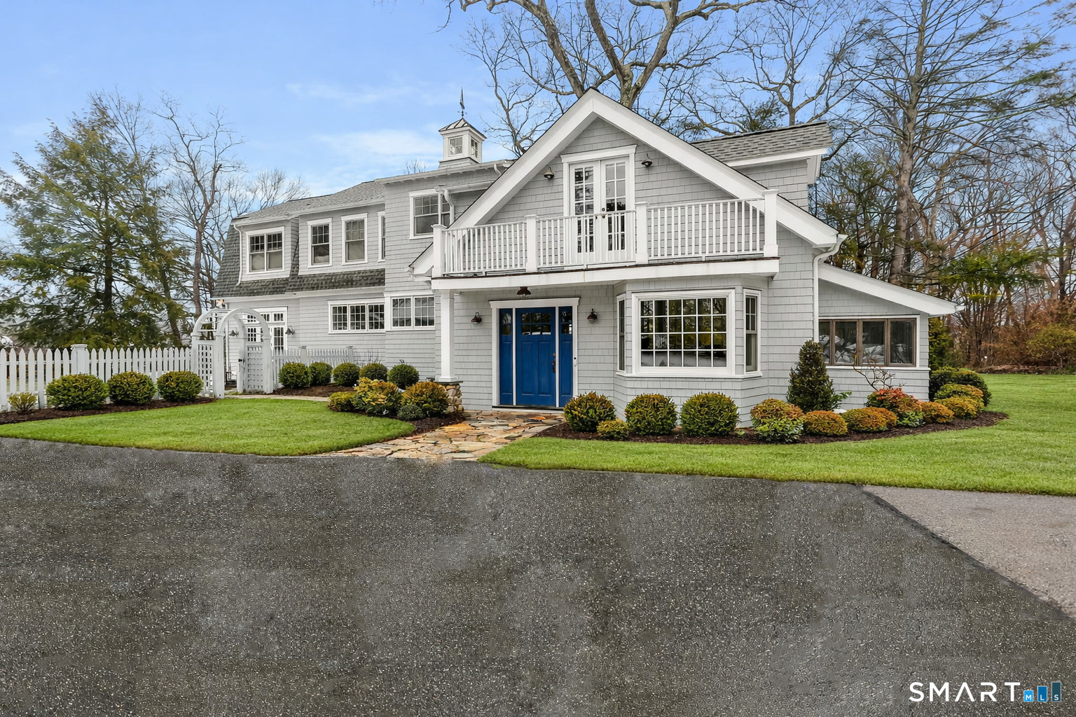3 Riverview Road Westport, CT 06880 - Photo 1 of 29 a front view of a house with a yard and trees